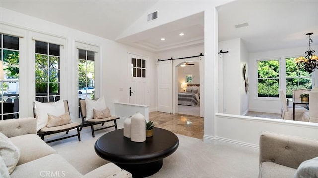 16 Bayleaf Ln, Irvine, CA 92620 - living room with a barn door, plenty of natural light, a chandelier, vaulted ceiling, and recessed lighting