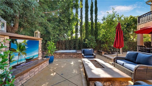 16 Bayleaf Ln, Irvine, CA 92620 - view of patio with an outdoor living space with a fire pit