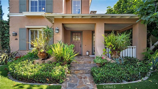 16 Bayleaf Ln, Irvine, CA 92620 - property entrance featuring stucco siding and covered porch