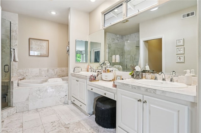 11272 Weatherby Rd, Los Alamitos, CA 90720 - bathroom with double vanity, a garden tub, a shower stall, and recessed lighting
