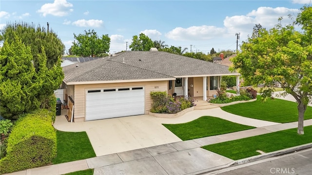 11272 Weatherby Rd, Los Alamitos, CA 90720 - ranch-style home featuring a garage, a front yard, driveway, and roof with shingles