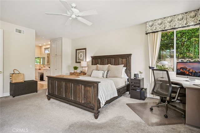 11272 Weatherby Rd, Los Alamitos, CA 90720 - bedroom featuring light colored carpet, an office area, ensuite bathroom, and a ceiling fan