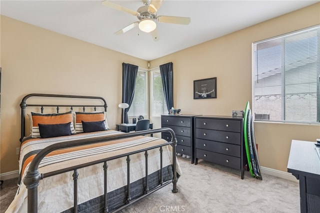 11272 Weatherby Rd, Los Alamitos, CA 90720 - carpeted bedroom featuring baseboards and ceiling fan