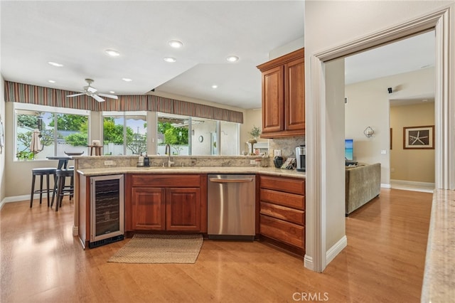 11272 Weatherby Rd, Los Alamitos, CA 90720 - kitchen with beverage cooler, dishwasher, light wood finished floors, ceiling fan, and recessed lighting