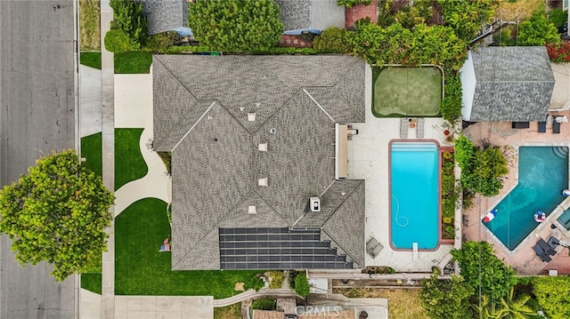 11272 Weatherby Rd, Los Alamitos, CA 90720 - drone / aerial view of a pool area