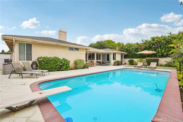 11272 Weatherby Rd, Los Alamitos, CA 90720 - view of pool featuring a diving board and a patio