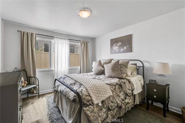 34586 Camino Capistrano Unit A, Dana Point, CA 92624 - bedroom with wood finished floors and baseboards