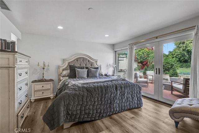 34586 Camino Capistrano Unit A, Dana Point, CA 92624 - bedroom with french doors, access to exterior, wood finished floors, and recessed lighting