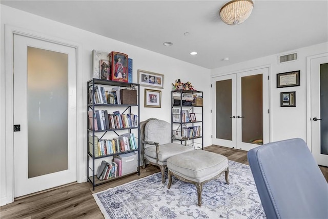 34586 Camino Capistrano Unit A, Dana Point, CA 92624 - living area with french doors, wood finished floors, and recessed lighting