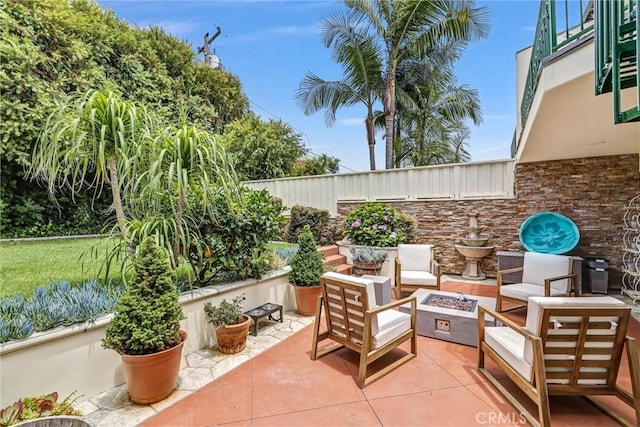 34586 Camino Capistrano Unit A, Dana Point, CA 92624 - view of patio with an outdoor fire pit
