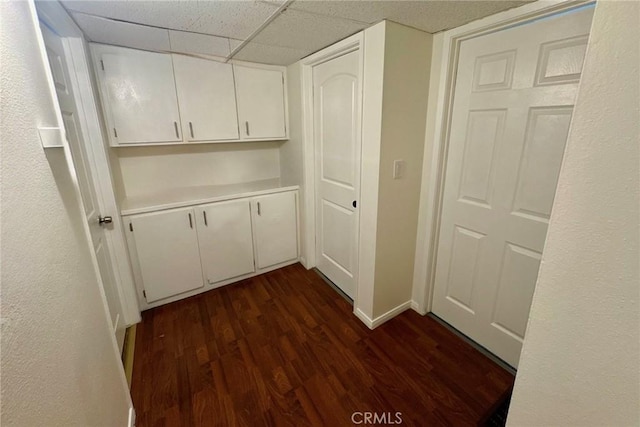 8601 International Ave Unit 271, Canoga Park, CA 91304 - hall with dark wood-type flooring and a paneled ceiling