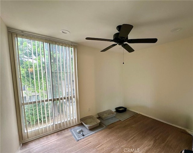 8601 International Ave Unit 271, Canoga Park, CA 91304 - spare room featuring wood finished floors and a ceiling fan