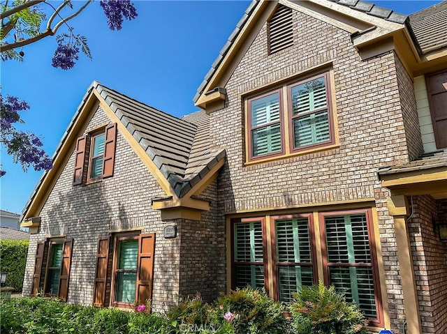 14207 Ashton Ln, Riverside, CA 92508 - view of side of home featuring brick siding