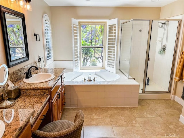 14207 Ashton Ln, Riverside, CA 92508 - full bathroom with plenty of natural light, a stall shower, vanity, and a garden tub