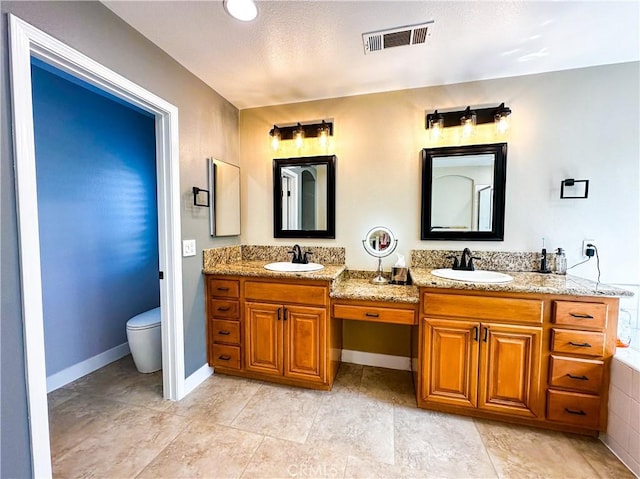 14207 Ashton Ln, Riverside, CA 92508 - full bathroom featuring double vanity and toilet