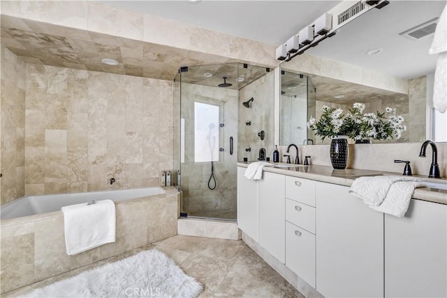 34586 Camino Capistrano Unit B, Dana Point, CA 92624 - bathroom featuring double vanity, a stall shower, and a bath
