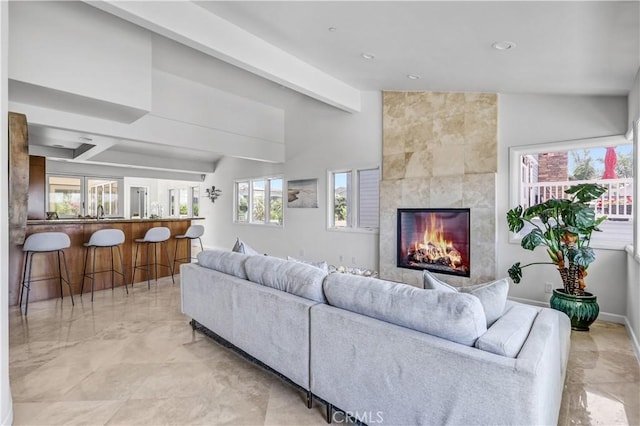 34586 Camino Capistrano Unit B, Dana Point, CA 92624 - living area with light marble finish flooring, a tile fireplace, and recessed lighting