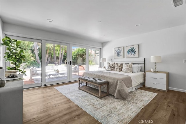 34586 Camino Capistrano Unit B, Dana Point, CA 92624 - bedroom featuring access to exterior, french doors, wood finished floors, and recessed lighting