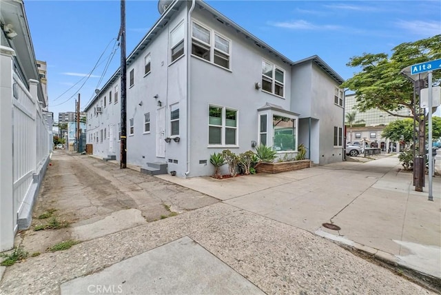 122 Elm Ave Unit 10, Long Beach, CA 90802 - back of house featuring stucco siding