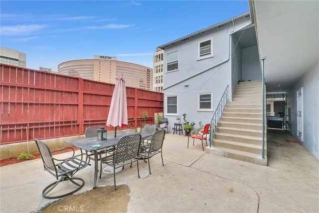 122 Elm Ave Unit 11, Long Beach, CA 90802 - view of patio / terrace with stairs and outdoor dining space