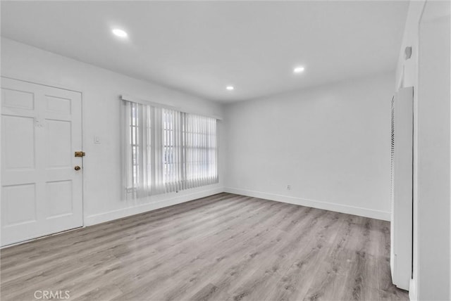 122 Elm Ave Unit 11, Long Beach, CA 90802 - unfurnished room featuring light wood-style floors and recessed lighting