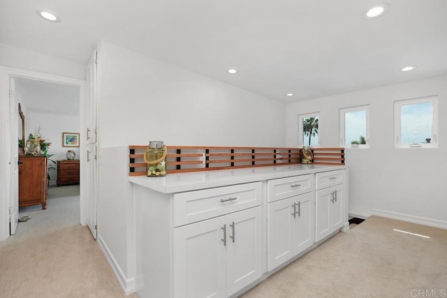 2203 Cameo Rd, Carlsbad, CA 92008 - kitchen featuring light colored carpet, white cabinetry, light countertops, and recessed lighting