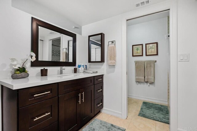 2203 Cameo Rd, Carlsbad, CA 92008 - bathroom featuring vanity and tile patterned floors