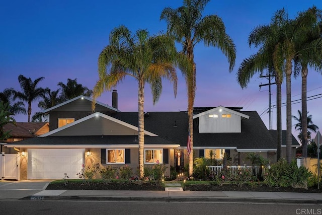 2203 Cameo Rd, Carlsbad, CA 92008 - view of front of property with an attached garage, driveway, and a chimney