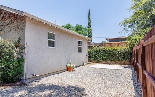 7441 Sylvia Ave, Reseda, CA 91335 - fenced backyard featuring a patio