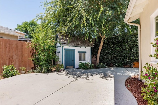 7441 Sylvia Ave, Reseda, CA 91335 - view of patio / terrace featuring a storage unit