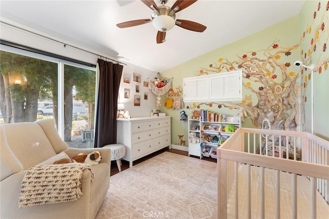4835 Almidor Ave, Woodland Hills, CA 91364 - bedroom with a nursery area, ceiling fan, and wood finished floors