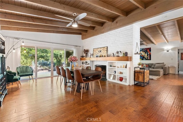 4835 Almidor Ave, Woodland Hills, CA 91364 - dining room with wood ceiling, hardwood / wood-style floors, a ceiling fan, and a fireplace