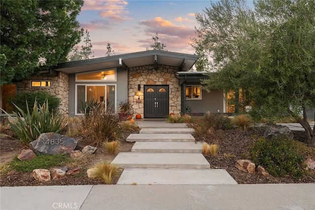 4835 Almidor Ave, Woodland Hills, CA 91364 - view of front of house featuring stone siding