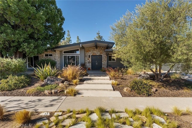4835 Almidor Ave, Woodland Hills, CA 91364 - view of front of property with stone siding