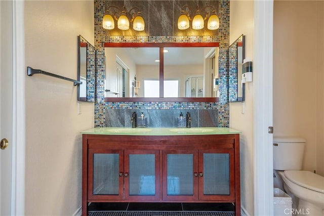 13238 Dancy St, Eastvale, CA 92880 - full bathroom featuring double vanity and backsplash