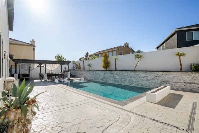 13238 Dancy St, Eastvale, CA 92880 - view of pool featuring a fenced backyard and a patio