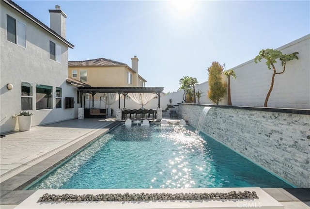 13238 Dancy St, Eastvale, CA 92880 - view of pool featuring a pergola, a fenced backyard, and a patio area