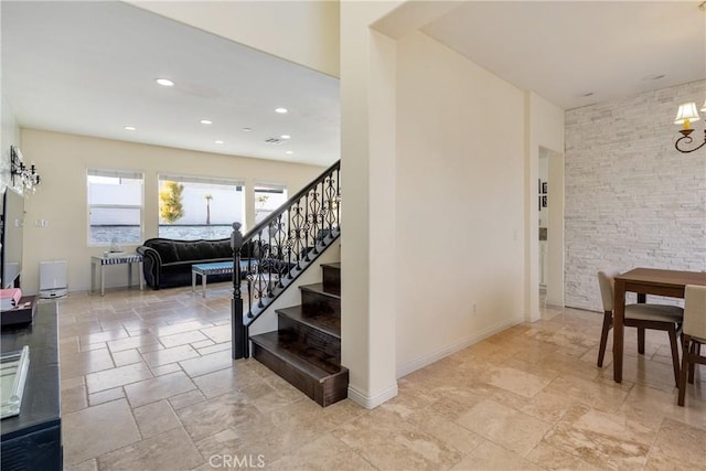 13238 Dancy St, Eastvale, CA 92880 - staircase featuring stone tile flooring and recessed lighting