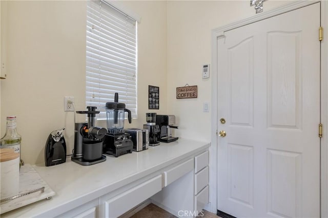 13238 Dancy St, Eastvale, CA 92880 - kitchen with light countertops and white cabinetry