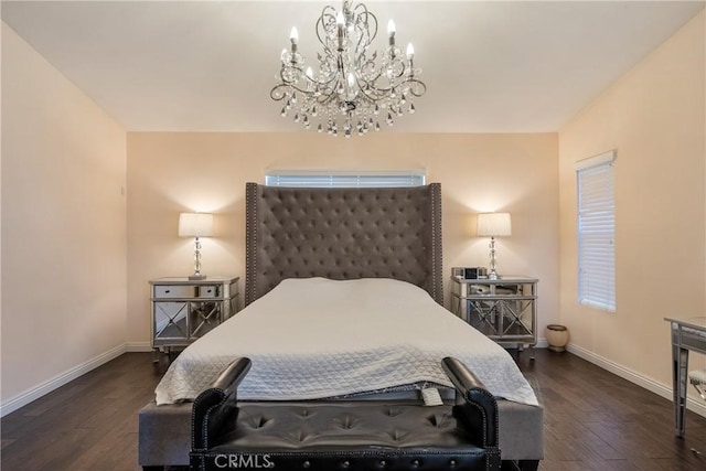 13238 Dancy St, Eastvale, CA 92880 - bedroom with dark wood-style flooring and a chandelier
