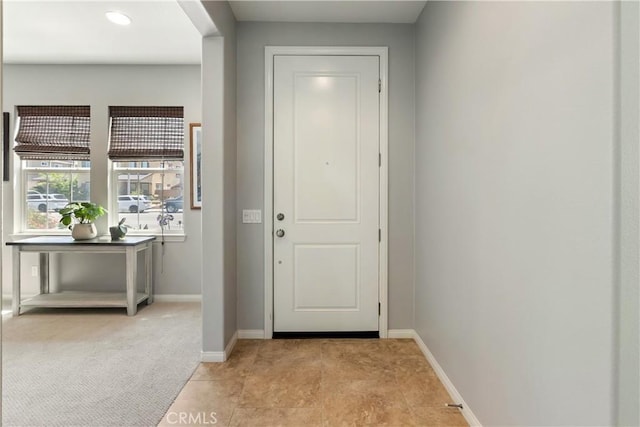 28233 Millstream Ct, Menifee, CA 92585 - doorway to outside featuring baseboards