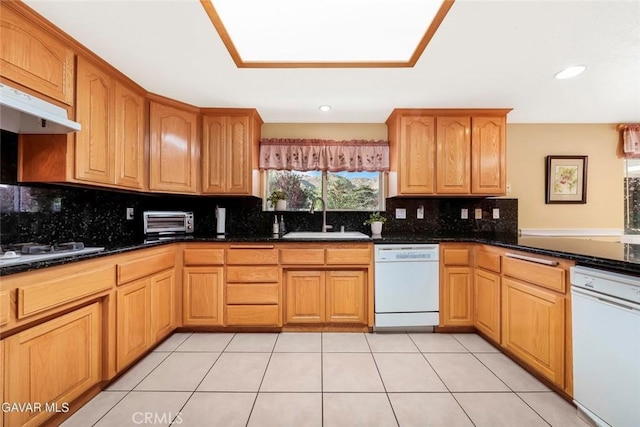 40505 90th St W, Palmdale, CA 93551 - kitchen featuring white appliances, backsplash, light tile patterned floors, and dark stone counters