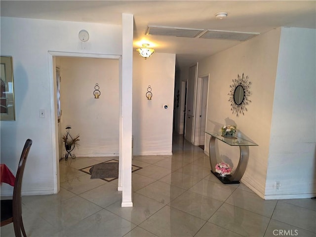 15901 Lassen St, North Hills, CA 91343 - hallway featuring light tile patterned floors