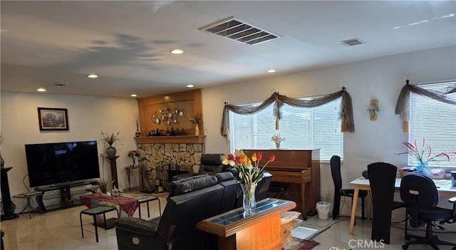 15901 Lassen St, North Hills, CA 91343 - living room with recessed lighting and light tile patterned floors