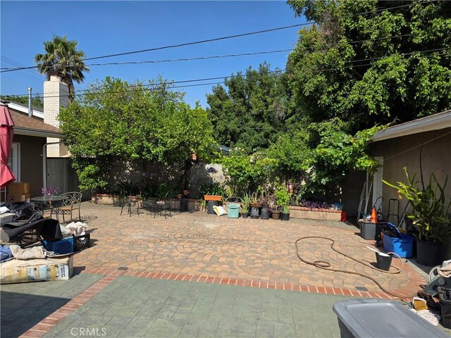 15901 Lassen St, North Hills, CA 91343 - fenced backyard with a patio