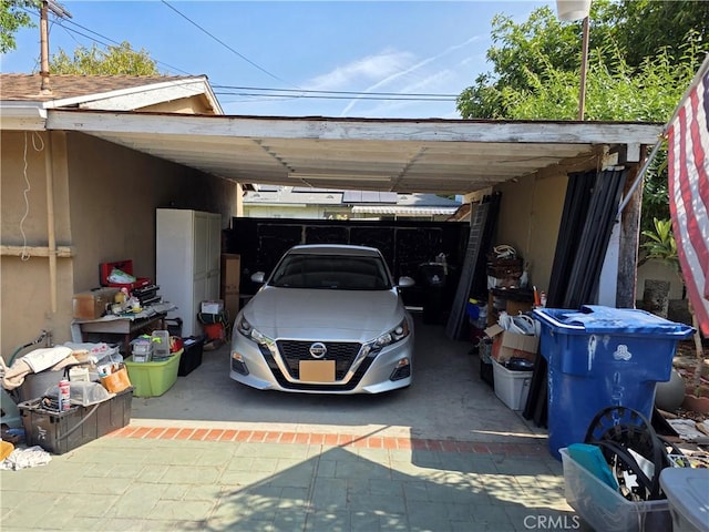 15901 Lassen St, North Hills, CA 91343 - view of vehicle parking featuring driveway and a carport