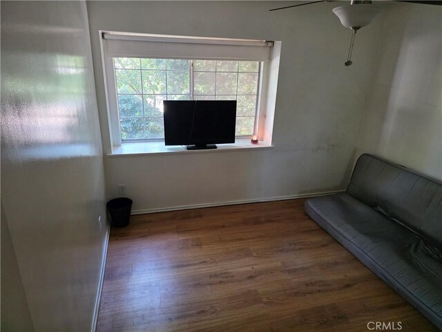 15901 Lassen St, North Hills, CA 91343 - unfurnished room with wood finished floors and baseboards