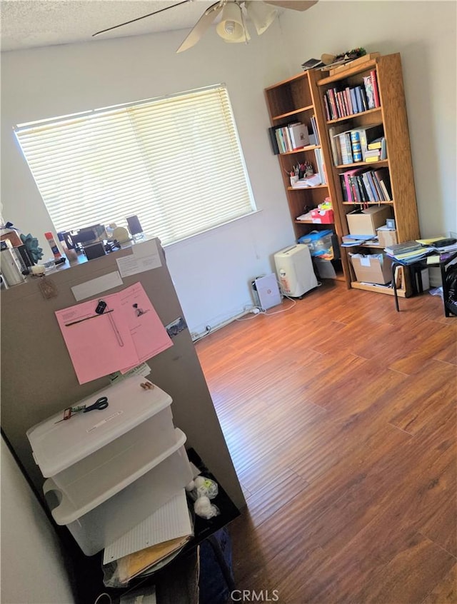 15901 Lassen St, North Hills, CA 91343 - office area featuring wood finished floors and a ceiling fan
