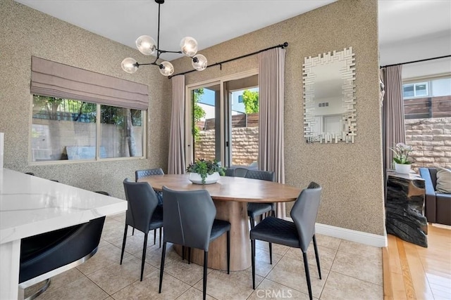 18330 Hanan Ct, Tarzana, CA 91356 - dining area with a chandelier and light tile patterned flooring