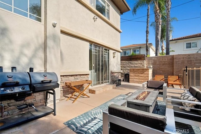 18330 Hanan Ct, Tarzana, CA 91356 - view of patio / terrace with an outdoor kitchen and an outdoor living space with a fire pit